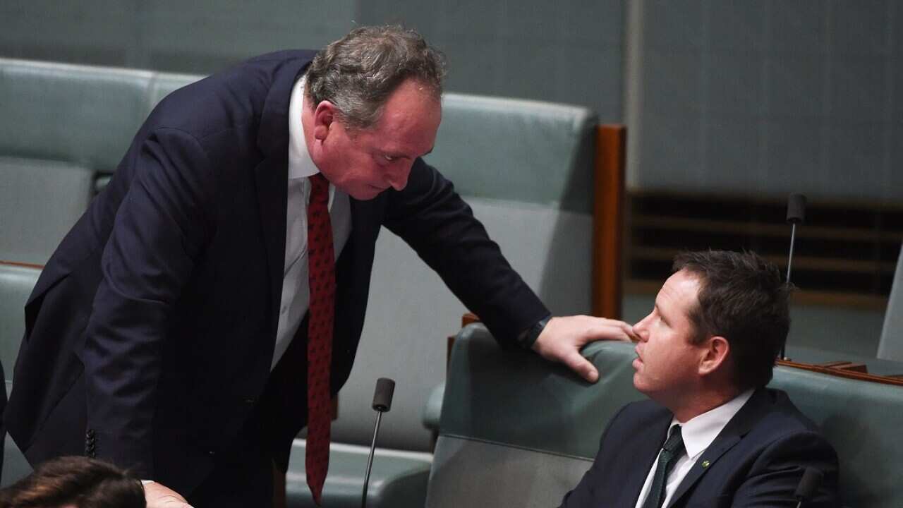 Deputy Prime Minister Barnaby Joyce and Nationals member Andrew Broad who has called for his leader to go to the backbench.