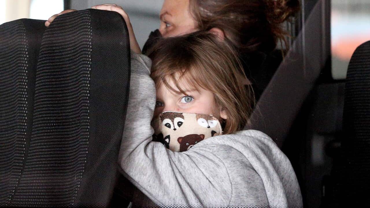 Passengers of an Aeroflot repatriation flight on a bus upon arrival at the Sheremetyevo International Airport from New York.