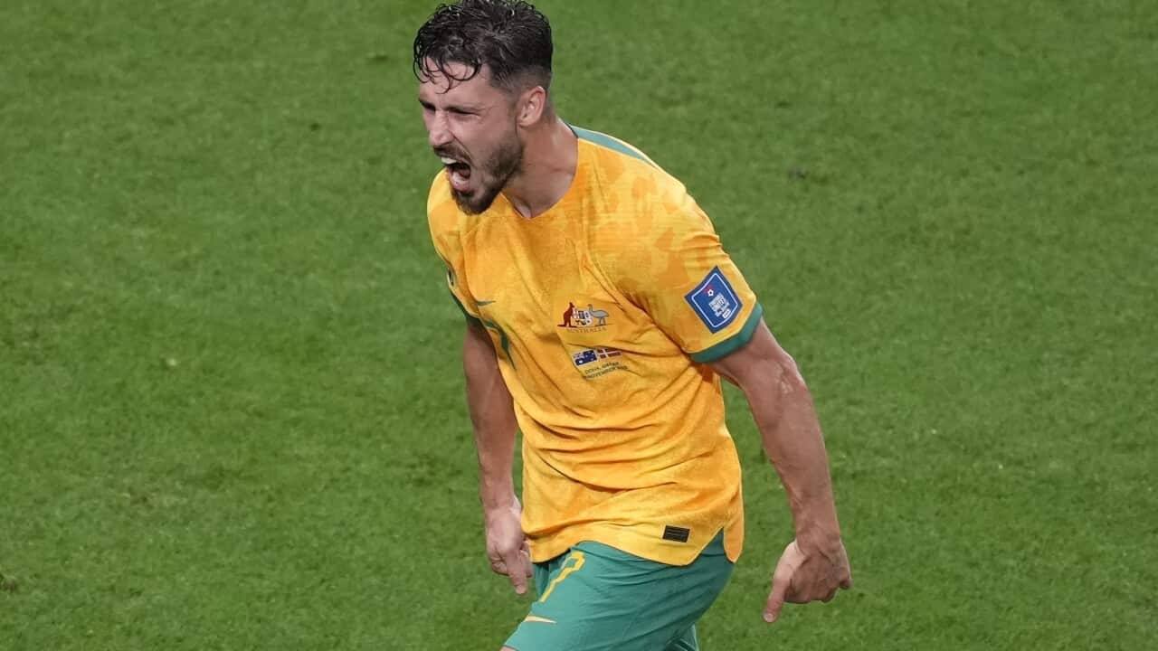 Man celebrating goal.