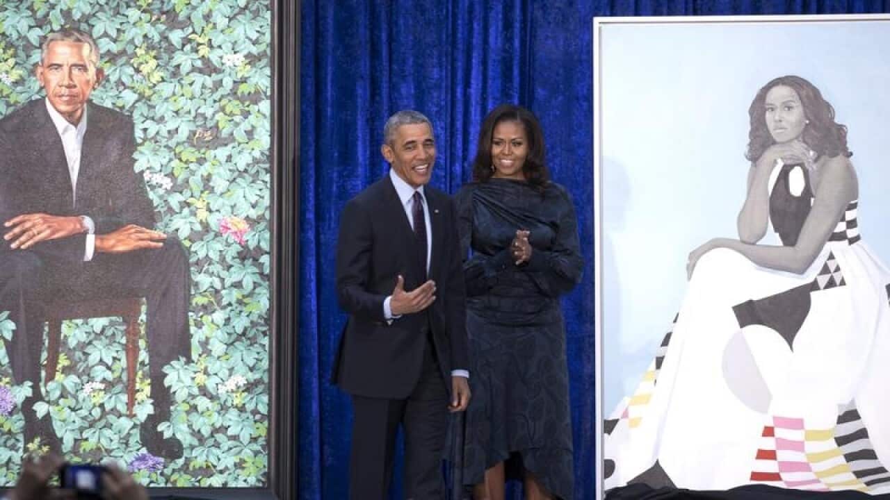 Former president Barack Obama and his wife Michelle have helped unveil their official portraits.
