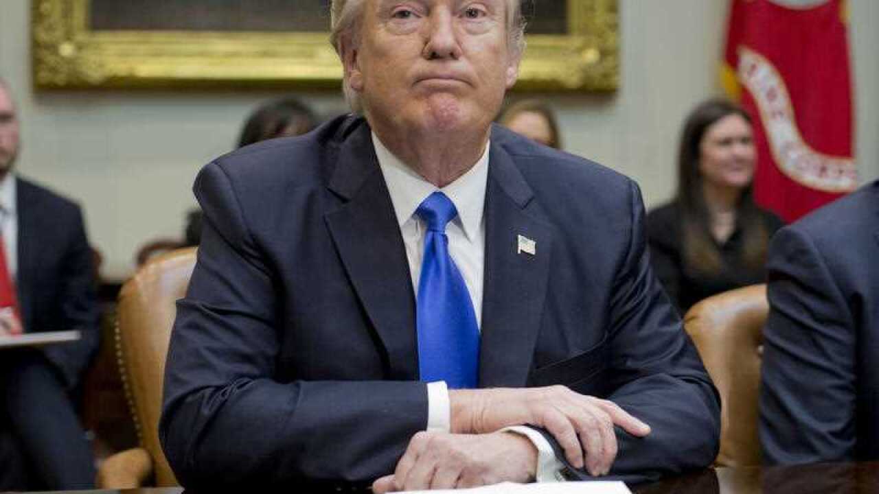 President Donald Trump pauses during a meeting in the Roosevelt Room of the White House in Washington, Wednesday, Feb. 1, 2017
