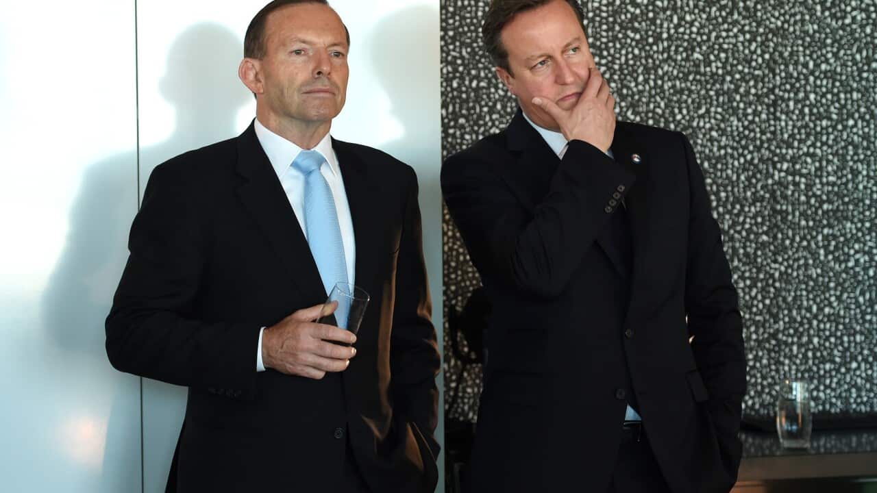 Australian Prime Minister Tony Abbott and UK Prime Minister David Cameron attend an infrastructure business breakfast