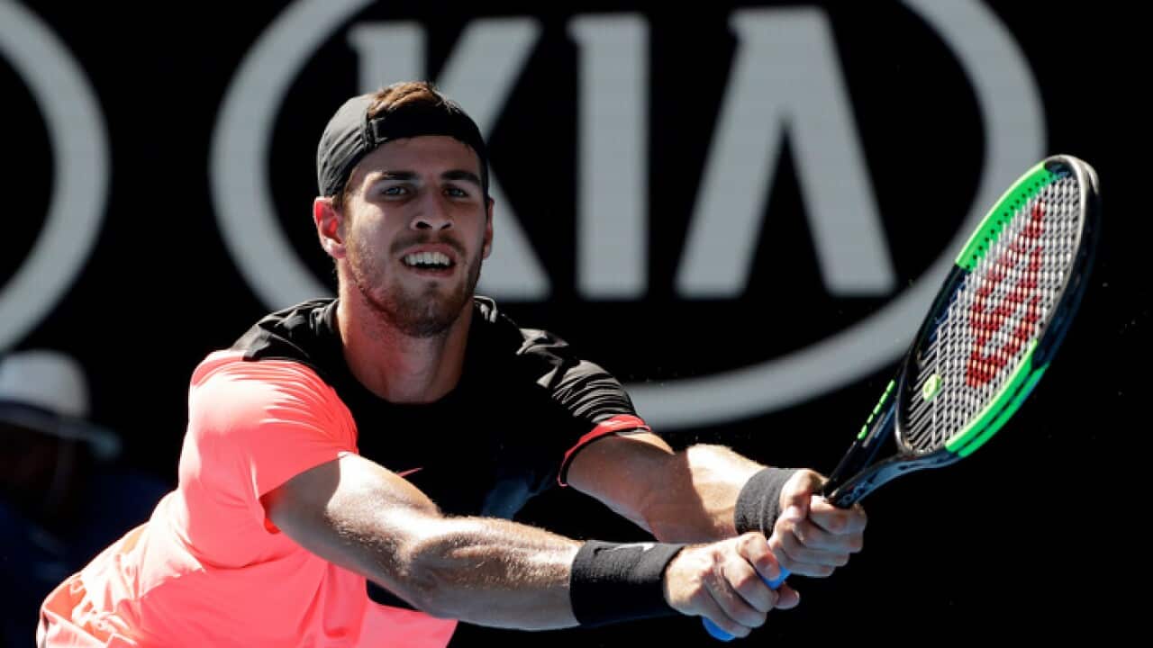 Russia's Karen Khachanov makes a backhand return to Argentina's Juan Martin del Potro during their second round match at the Australian Open tennis championships in Melbourne, Australia, Thursday, Jan. 18, 2018. (AP Photo/Dita Alangkara)