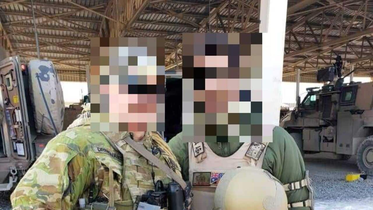 The unnamed Afghan interpreter who was evacuated on Wednesday (right) while serving with the Australian Defence Force
