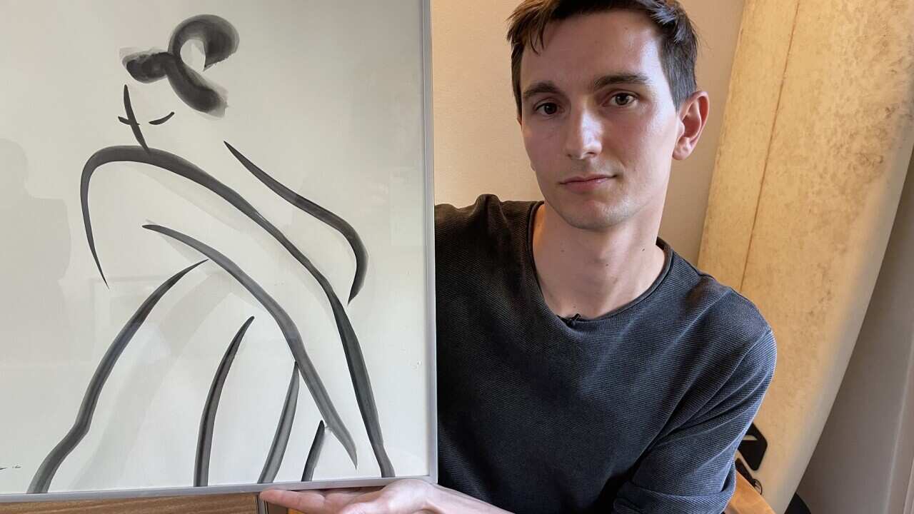 Trash Lawyer Leonardo Urbano, with one of of his rescued treasures (SBS-Sandra Fulloon).jpg