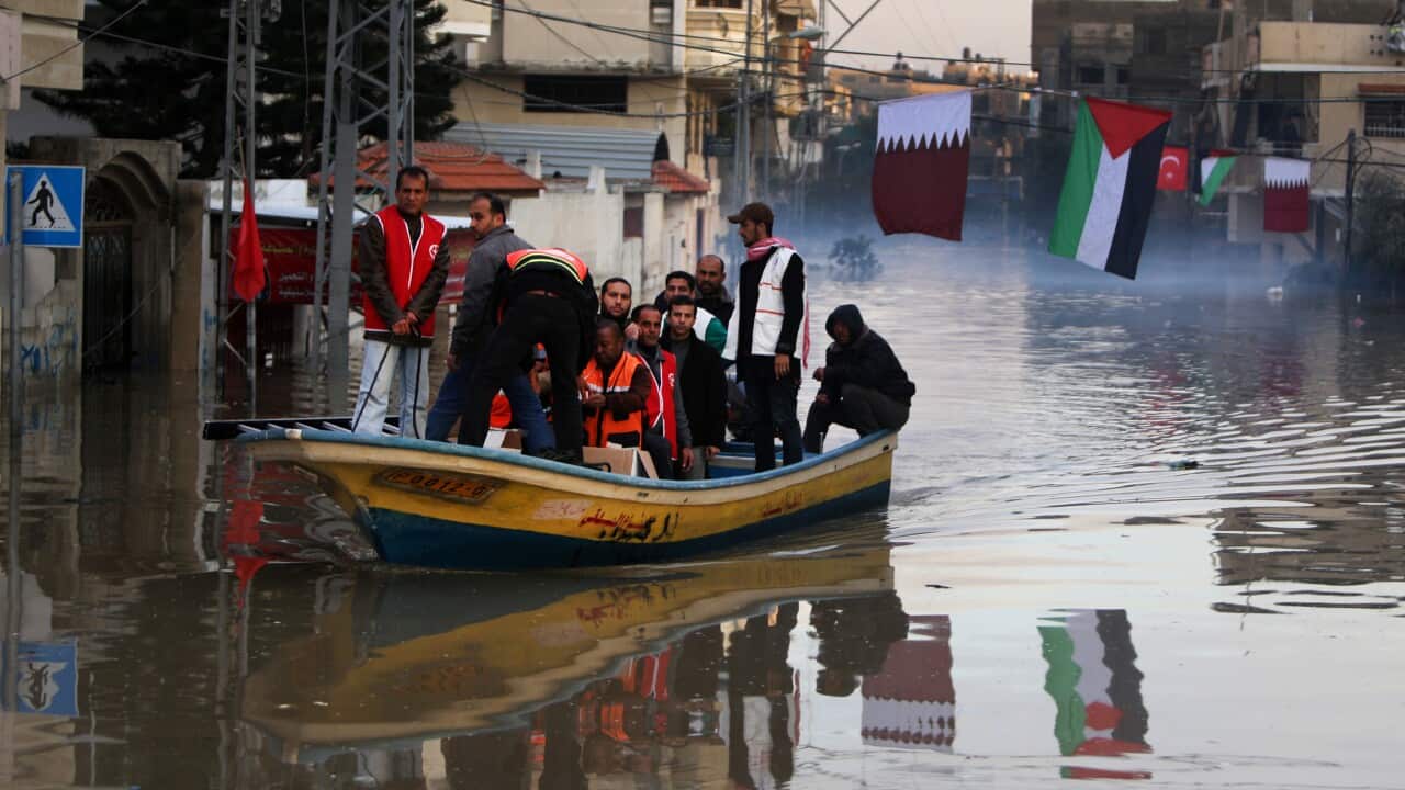 Palestinians are evacuated from a flooded part of Gaza City - Getty.jpg