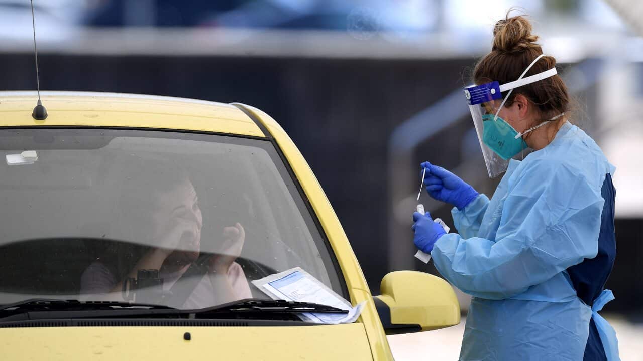A person is seen being tested at a coronavirus testing facility at Bondi Beach in Sydney, Thursday, October 15, 2020. COVID-19 clusters in Sydney continue to grow, with authorities issuing new alerts. (AAP Image/Dan Himbrechts) NO ARCHIVING