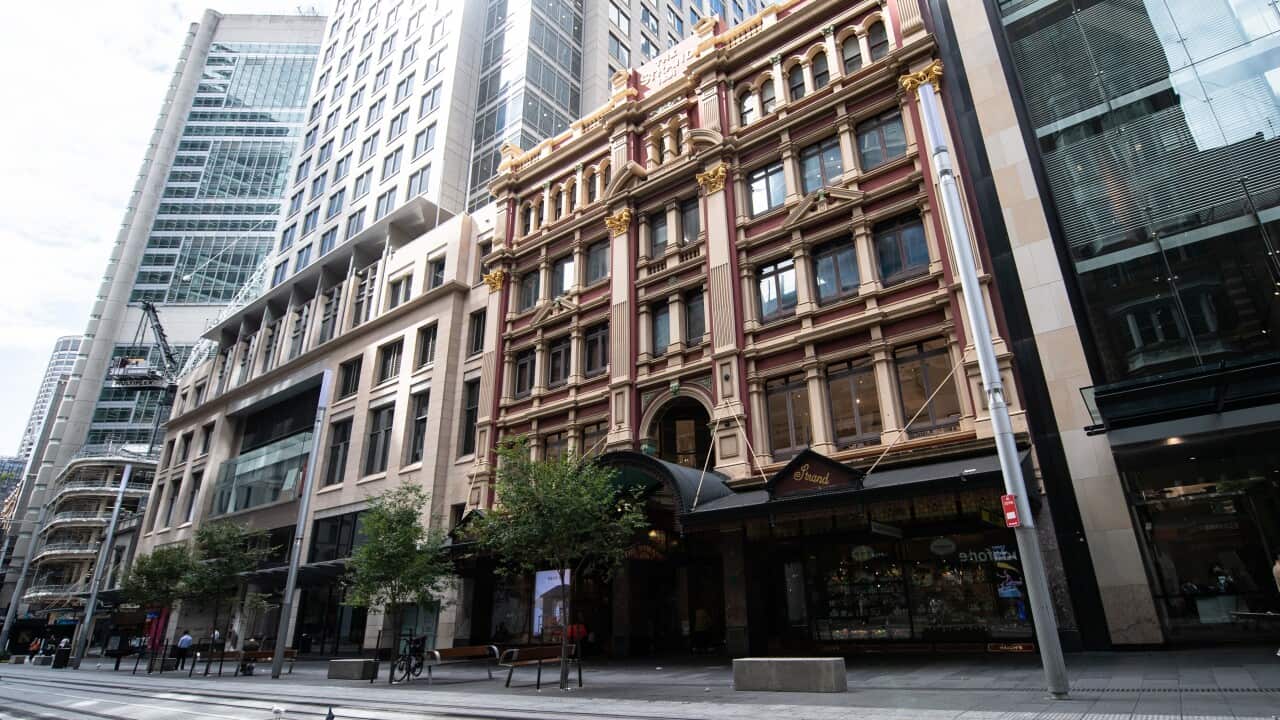 A quieter than usual Pitt Street Mall, Sydney, Friday, March 27, 2020. The Australian Federal Government have introduced strict social distancing rules in an effort to contain the COVID-19 Coronavirus pandemic. (AAP Image/James Gourley) NO ARCHIVING