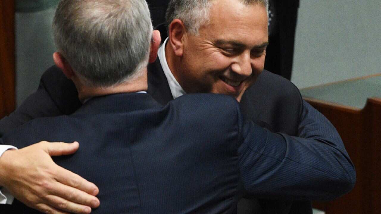 Former treasurer Joe Hockey hugs Prime Minister Malcolm Turnbull