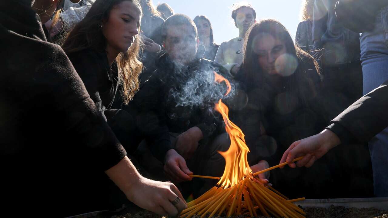 Students honor the victims of the Kocani night club fire