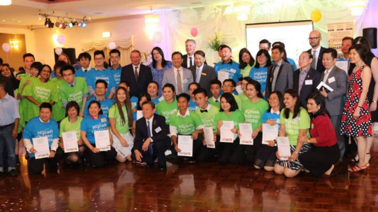 Richard Lim with volunteers and sponsors at Monash Health funds raising event