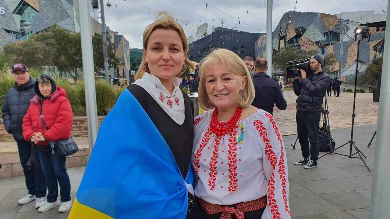 People at Ukraine flag raising in Melbourne (SBS).jpg