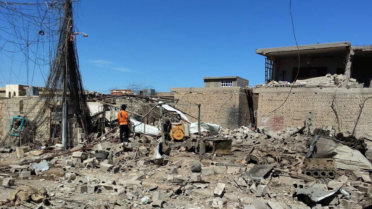 An Iraqi man inspects the rubble of a house destroyed in an apparent airstrike carried out by the Iraqi army on Fallujah. (EPA)