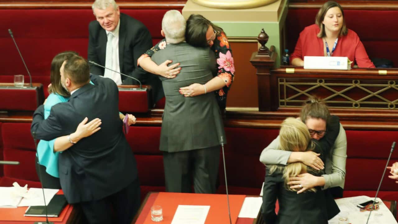 Victorian MPs show emotion after the Voluntary Assisted Dying Bill 2017 passed in the Victorian Legislative Council in Melbourne, Wednesday, November 22, 2017. (AAP Image/David Crosling) NO ARCHIVING