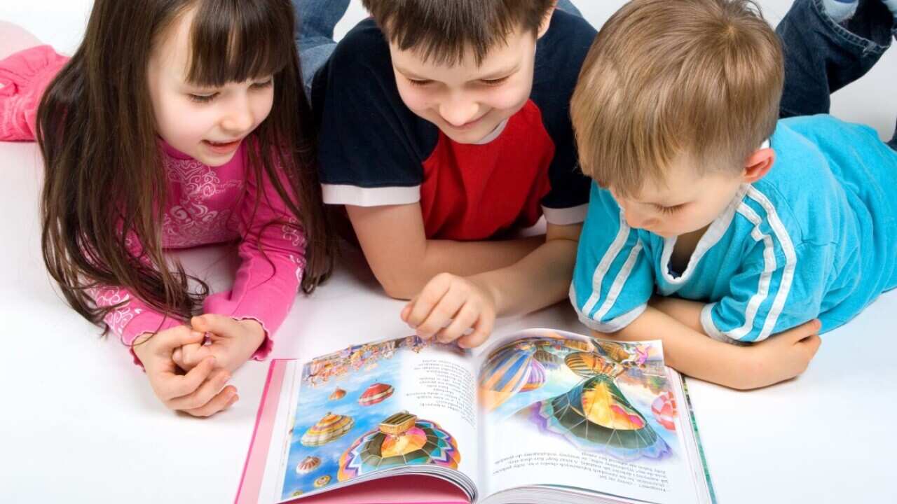 Children reading books.