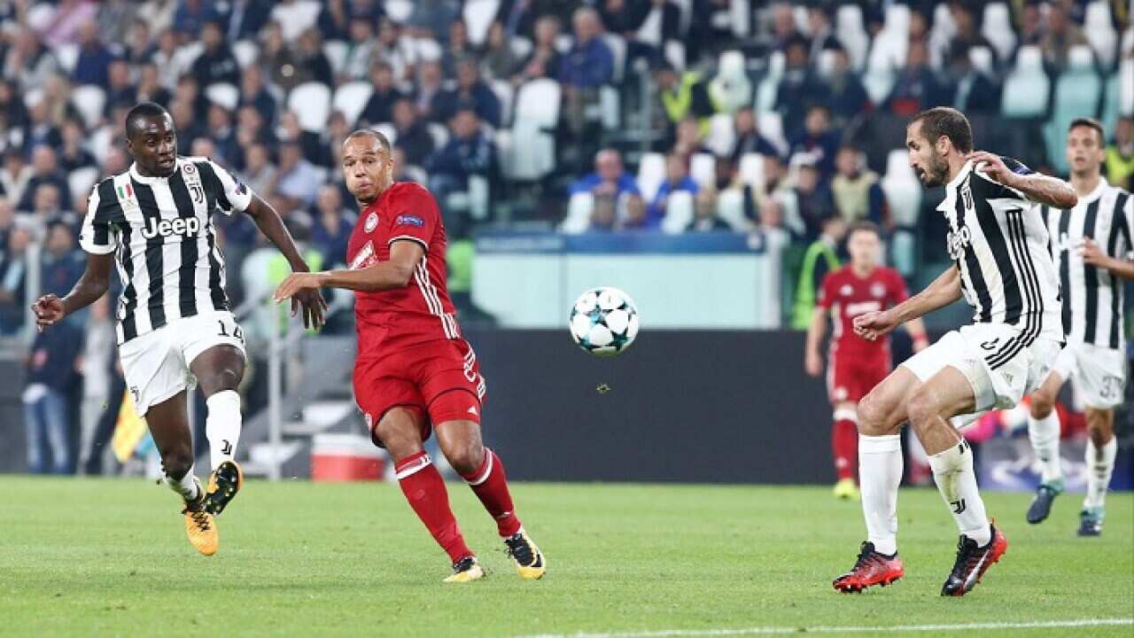 Juventus beats Olympiakos 2-0 to advance in Champions League