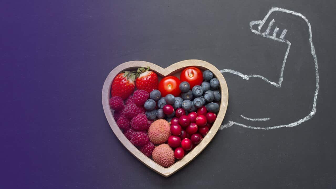Heart of fruit with arm flexing