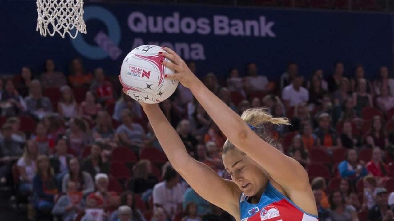 Sophie Garbin of the NSW Swifts in action against Queensland Fever.