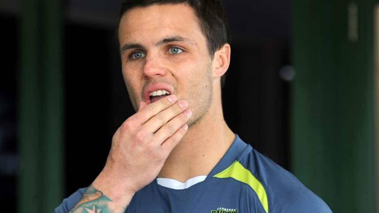 Sandor Earl speaking to the media before training in Canberra.