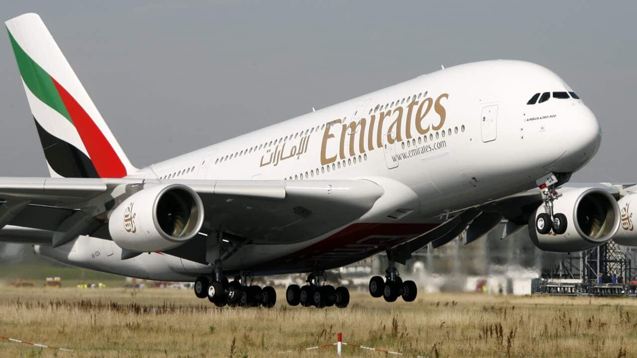 Emirates Airlines plane on the runway