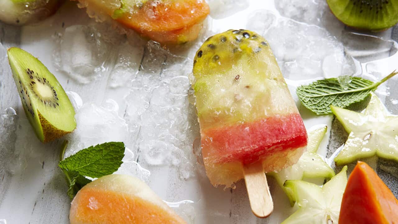 Homemade lemonade and tropical fruit ice pops