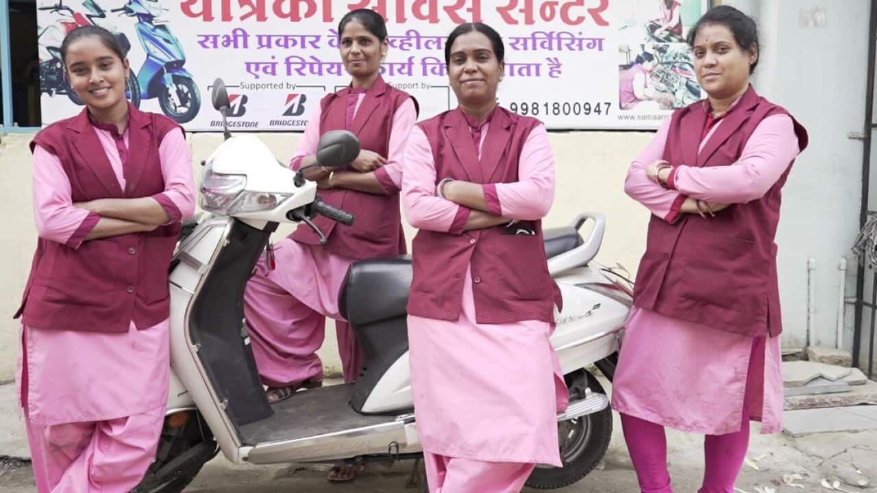 Women mechanics run a bike servicing centre in India's Indore city.