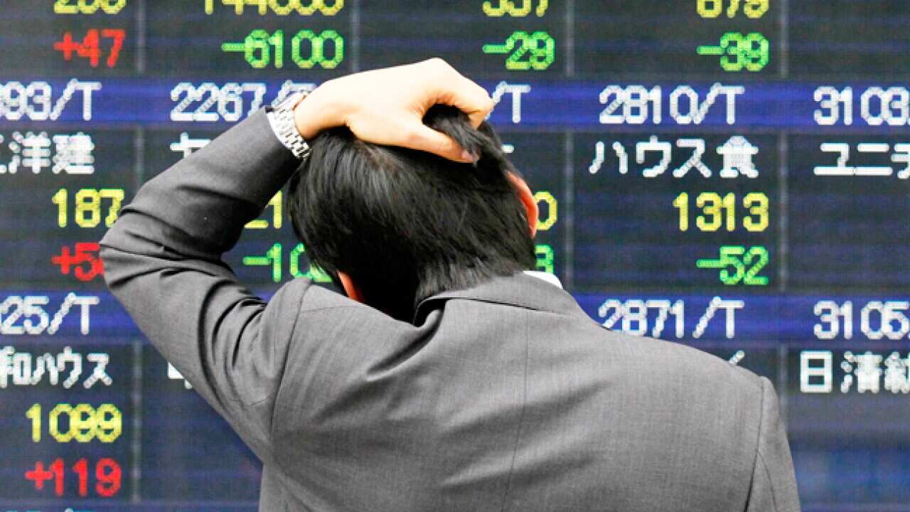 japan_earthquake_market_150311_B_AAP_751347949