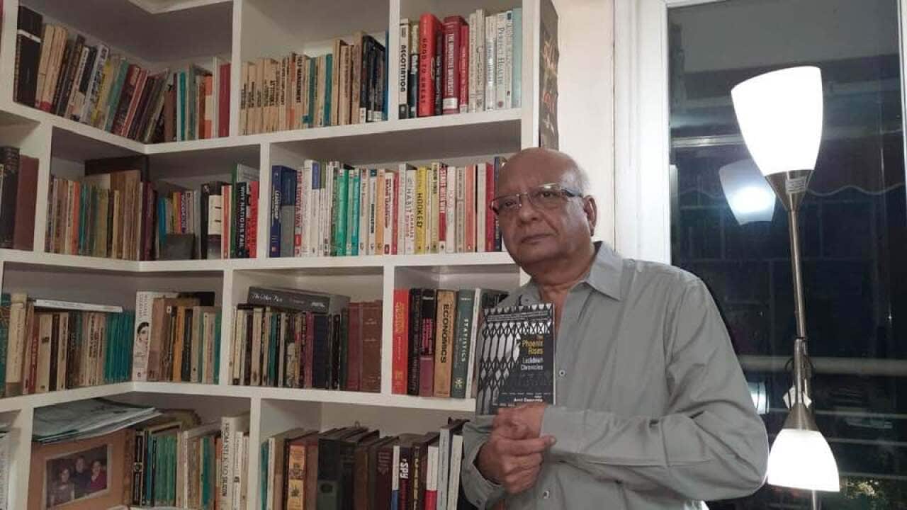 Amit Dasgupta with the Book The Phoenix Rises Lockdown Chronicles
