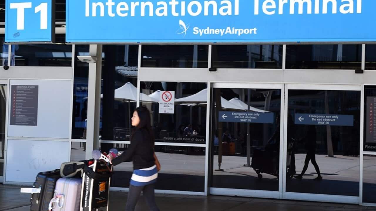 Travellers at the Sydney International Airport