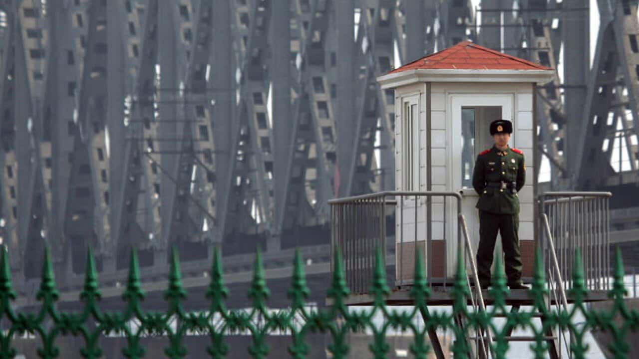Guard patrolling China, North Korea border