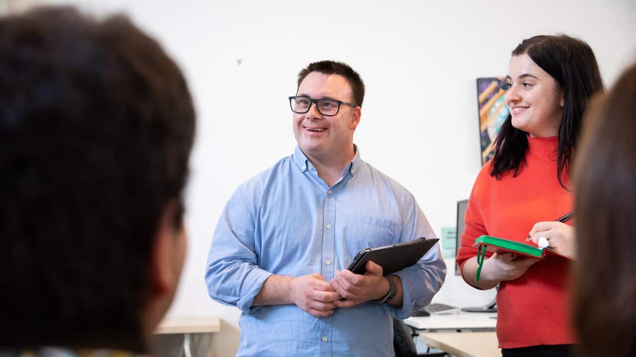 Man with down syndrome host a meeting
