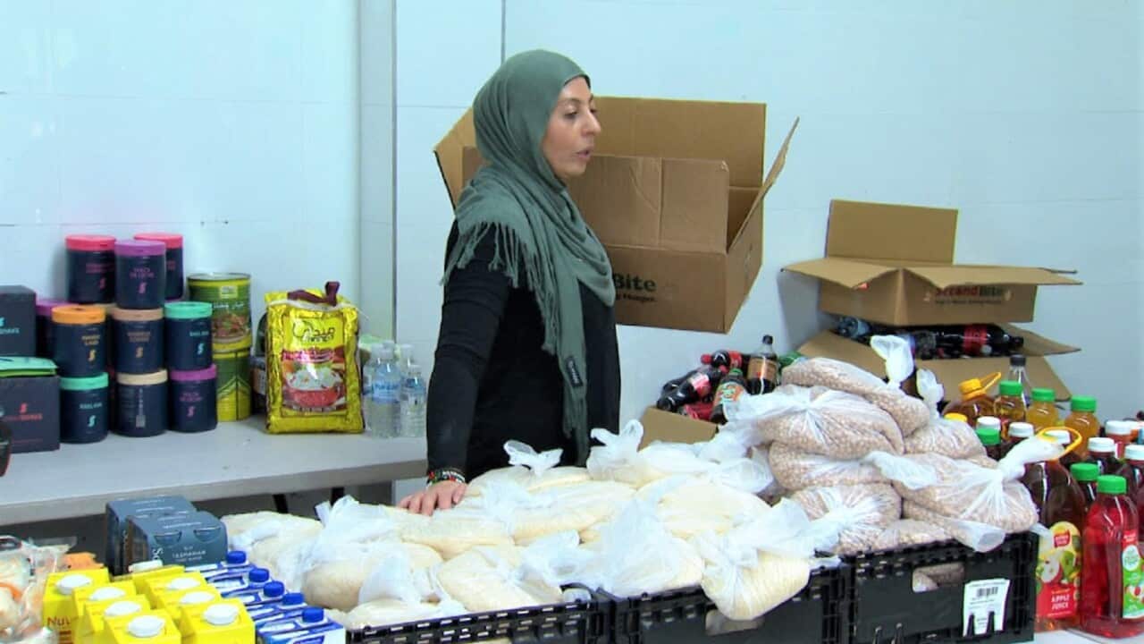 A volunteer at Sydney Community Connect which is giving free food to disadvantaged families during Ramadan (SBS Arabic).jpg