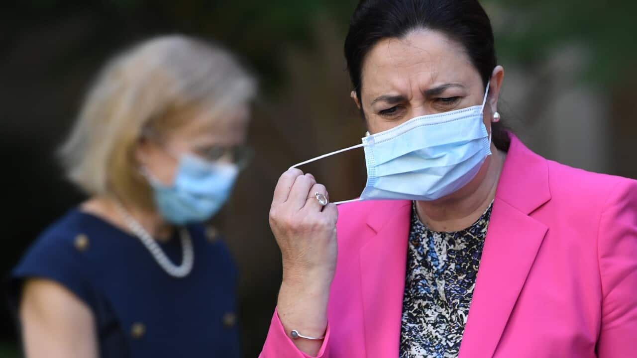 Queensland Premier Annastacia Palaszczuk (right) and Queensland Chief Health Officer Jeannette Young