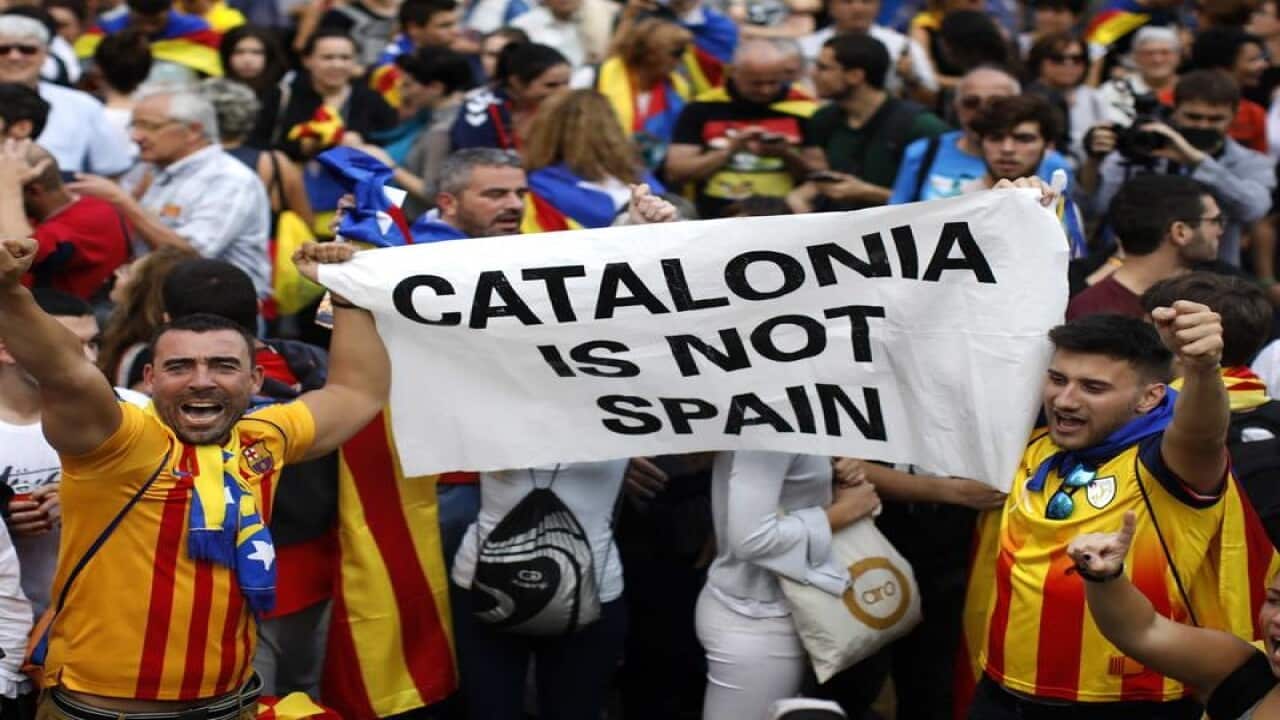 People celebrate Catalonia's independence declaration from Spain.