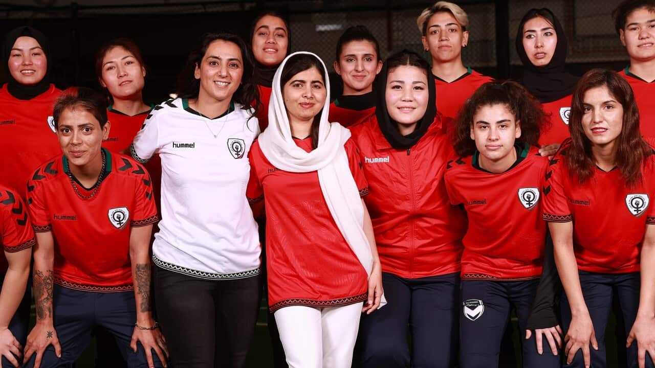 Nobel Peace Prize Winner Malala Yousafzai takes a group photo with the Afghan women's team.