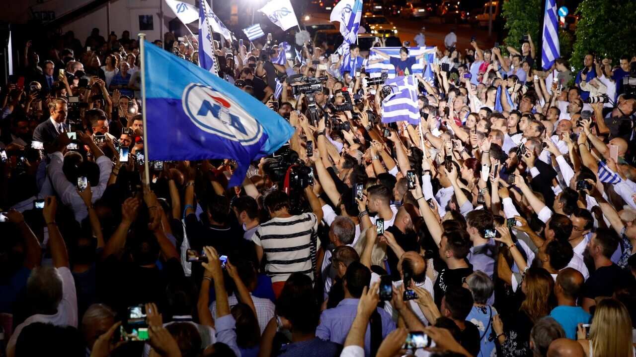 Greek opposition New Democracy conservative party leader Kyriakos Mitsotakis talks to his supporters.
