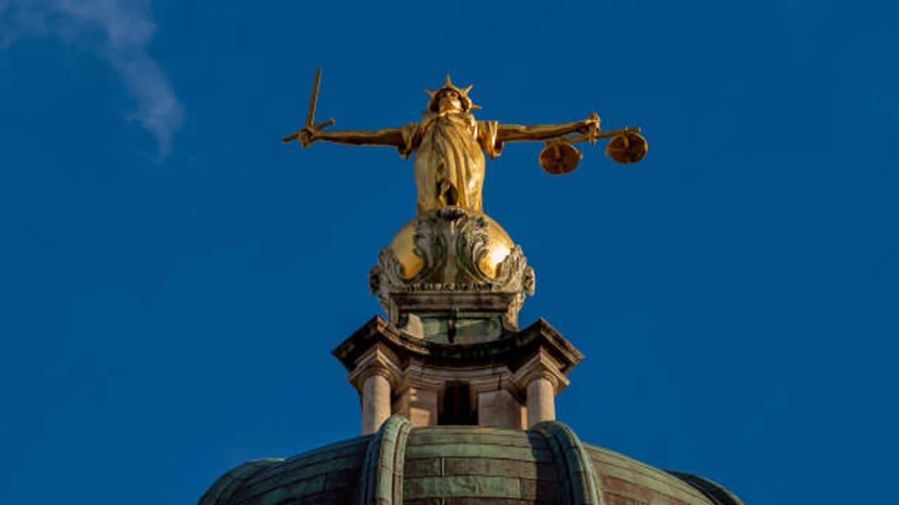 The gilt bronze sculptor of Lady Justice.jpg