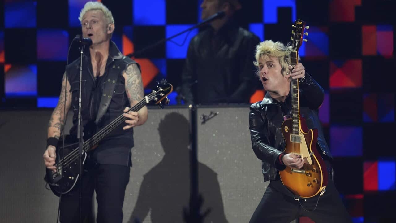Mike Dirnt, Billie Joe Armstrong of Green Day perform during the FireAid benefit concert.