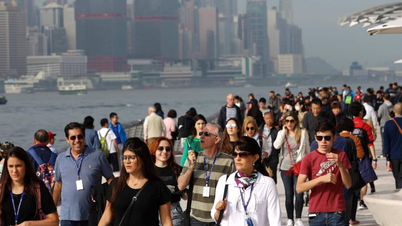 Tourists in Tsim Sha Tsui tourist spot