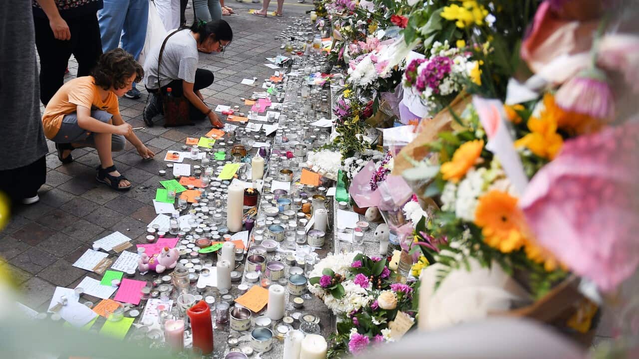 Floral tributes close to Grenfell Tower, the 24-storey apartment block in North Kensington, London.