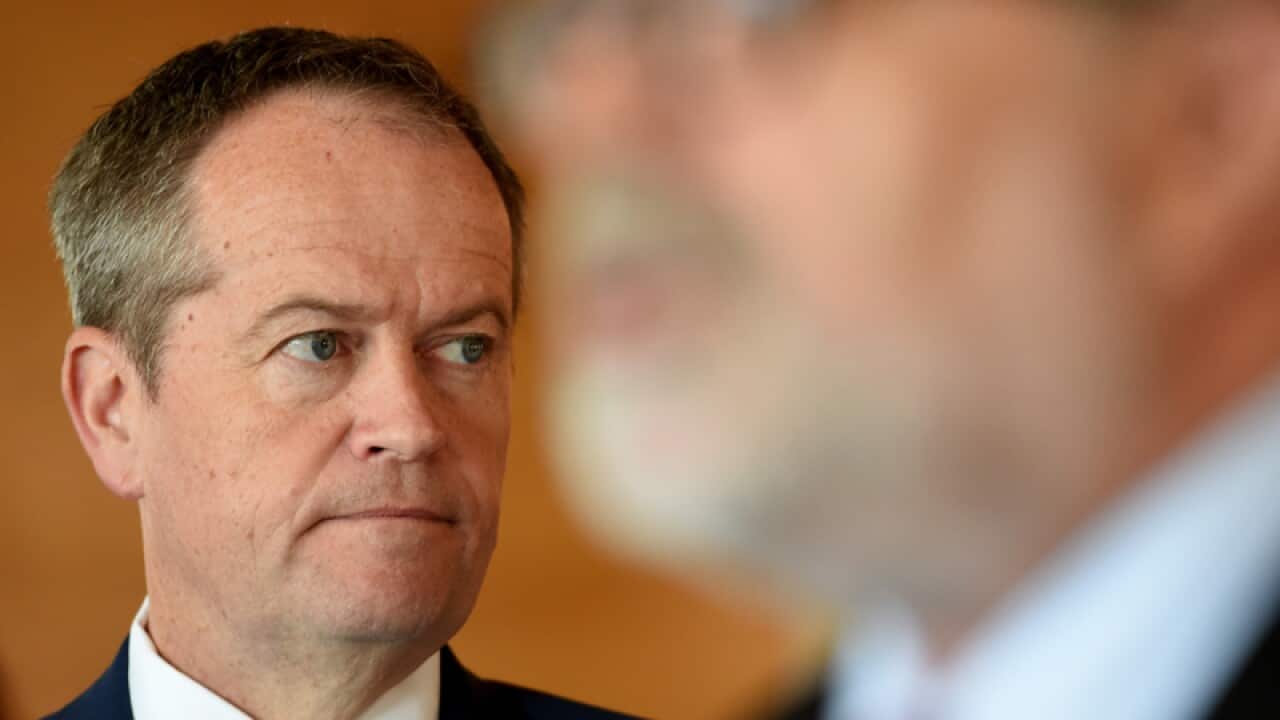 Bill Shorten (centre) and Kim Carr (right)