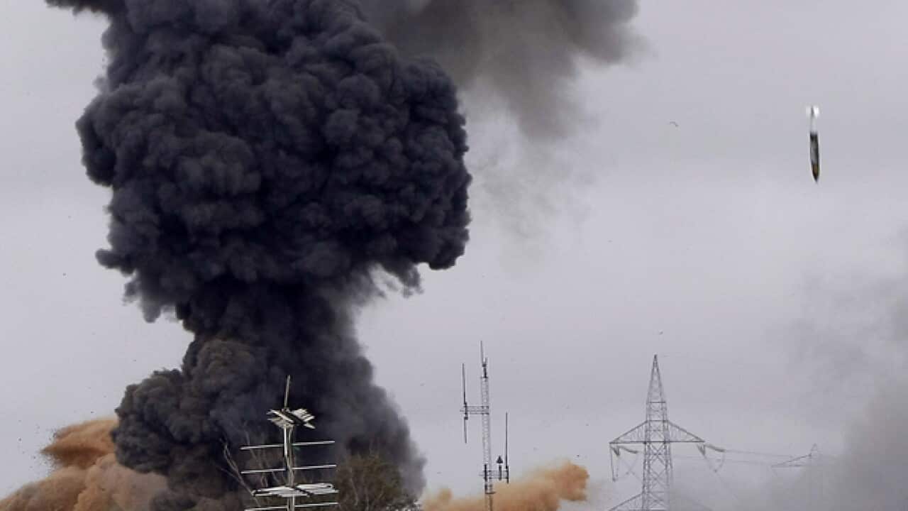 NATO-Bomb_Libya_file_230411_B_AAP_1550916478