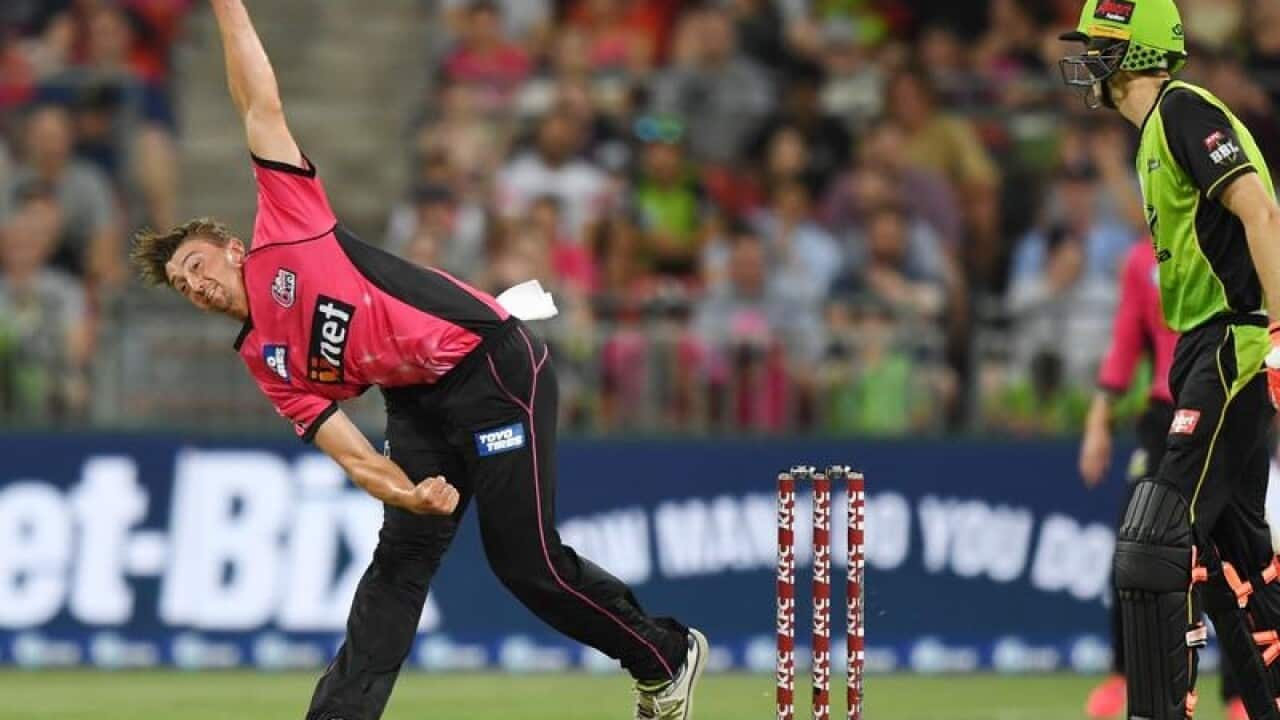 Daniel Sams of the Sixers bowls during the Big Bash League.