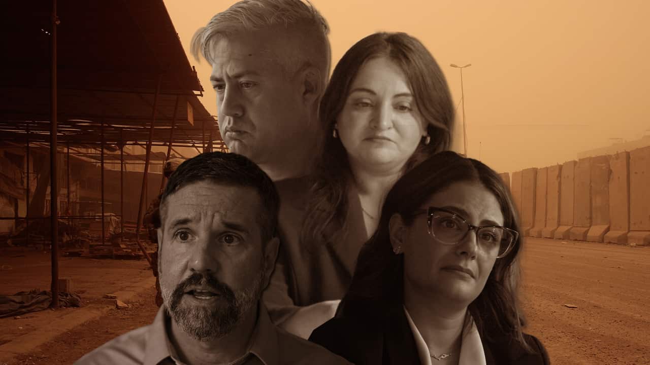 A sepia-toned collage features four somber-looking individuals superimposed over images of a desolate urban structure and a concrete security wall under a hazy, dust-filled sky.