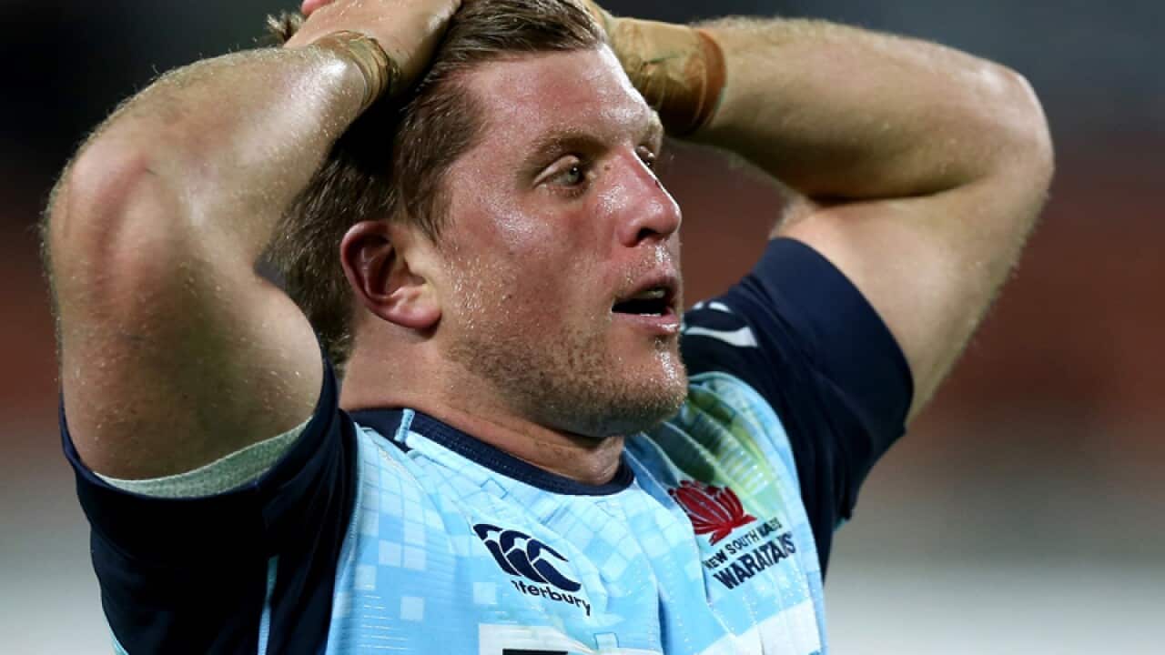 Damien Fitzpatrick of the Waratahs reacts to defeat