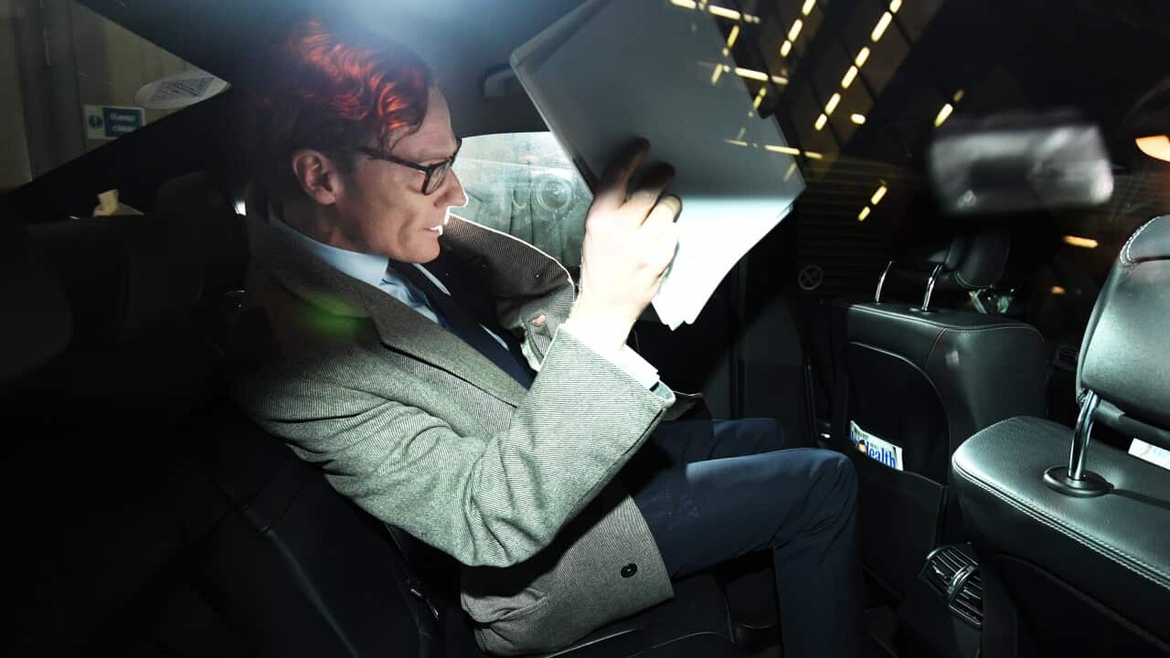 Alexander Nix, CEO of the London-based political consulting firm 'Cambridge Analytica' leaves his offices through the back door in London, Britain, 20 March 2018.