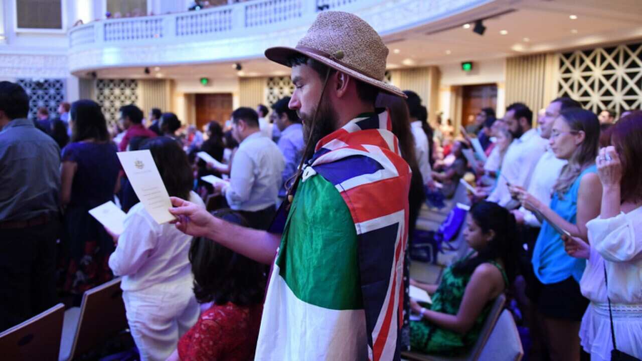 Australian citizenship recipients attend a citizenship ceremony on Australia Day 2017 in Brisbane