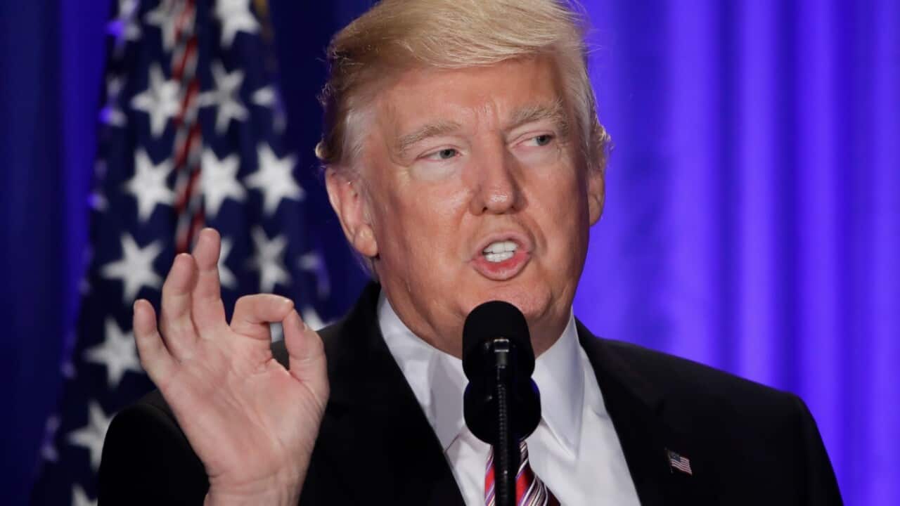 President Donald Trump gestures while speaking at the Republican congressional retreat in Philadelphia, Thursday, Jan. 26, 2017.