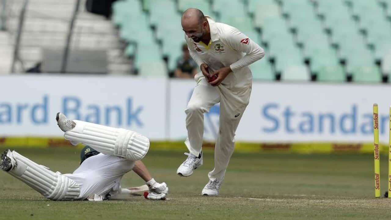 Nathan Lyon taunts AB de Villiers after running him out.