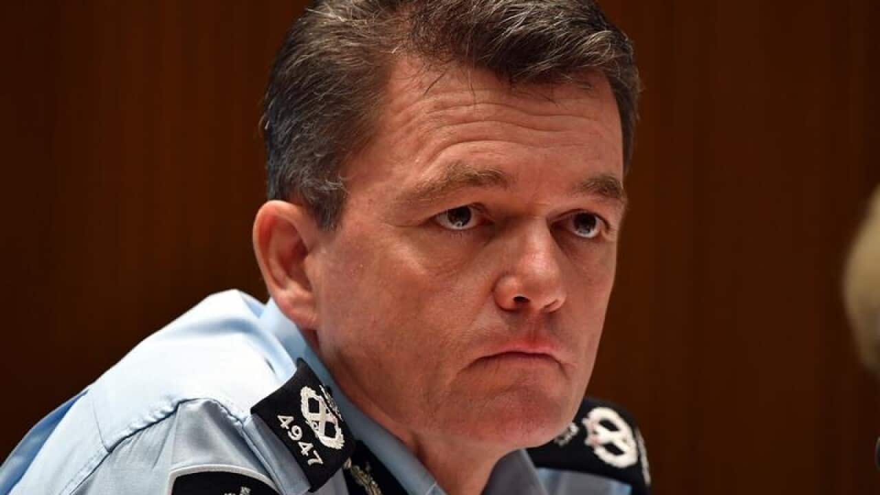 Australian Federal Police Commissioner Andrew Colvin appears.